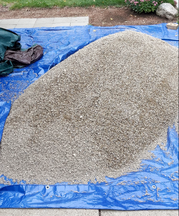 This image has an empty alt attribute; its file name is pile-of-pea-gravel.png